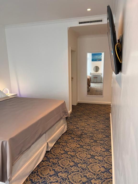Zimmer Rosengarten Bett